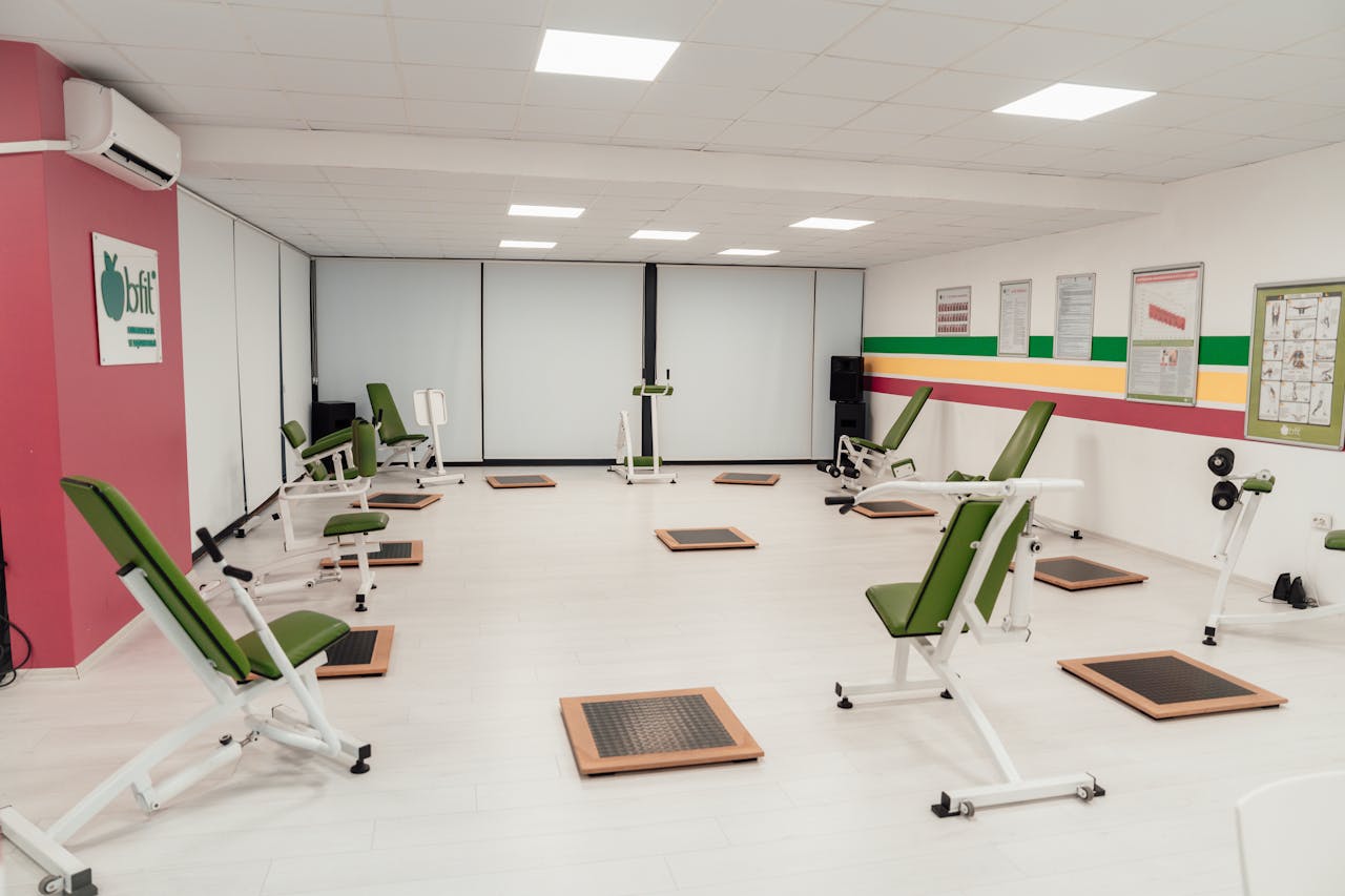 Bright and spacious gym interior featuring modern green exercise machines in Yalova.